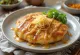 Okonomiyaki sosu ve bonito pulları ile servis edilen, zencefille yapılmış okonomiyaki