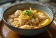 Zengin tatlar ve pirinç dokusuyla bir kase çorba, Tavuklu Arroz Caldo